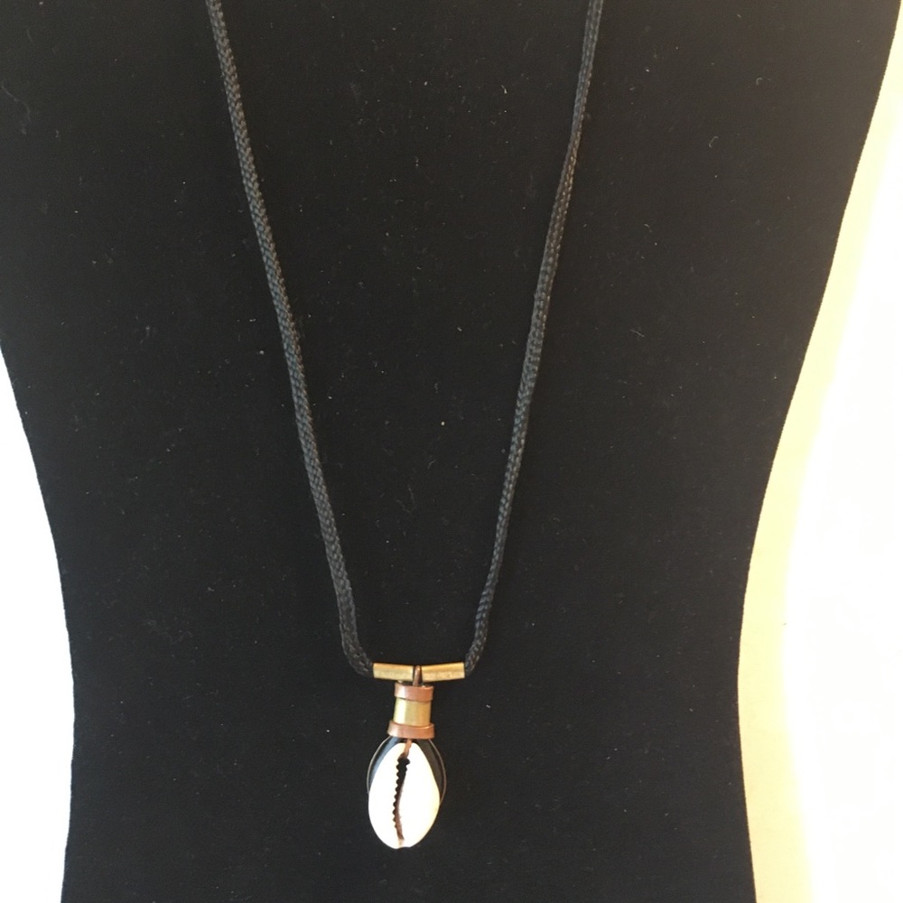 Cowrie shell and brass necklace